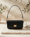 Mira – piccola borsa a mano in pelle